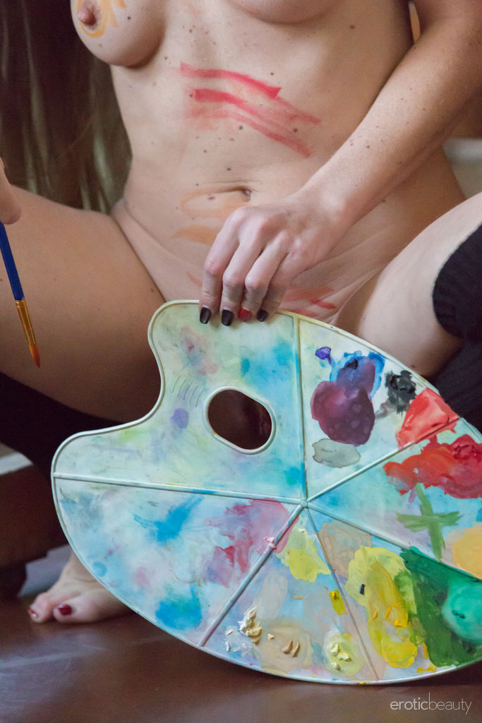 Mika A in  Art At Work  for Erotic Beauty - Mika A flaunts her sexy, tight body as she paints in the room.
