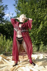 Darcia in  Presenting Darcia  for Erotic Beauty - Darcia playfully poses at the beach baring her petite body.