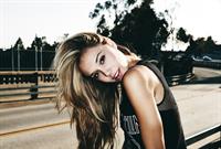 Alexis Ren in a Led Zeppelin shirt