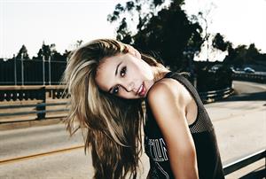 Alexis Ren in a Led Zeppelin shirt