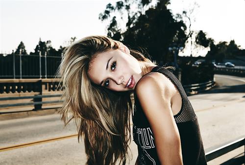 Alexis Ren in a Led Zeppelin shirt