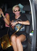 Miley Cyrus Spotted in a Join A Weird Trip T-shirt outside the London Studios in London (18.07.2013) 