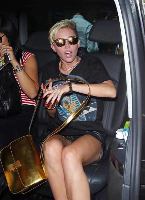 Miley Cyrus Spotted in a Join A Weird Trip T-shirt outside the London Studios in London (18.07.2013) 