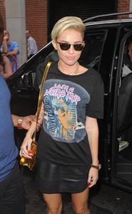 Miley Cyrus Spotted in a Join A Weird Trip T-shirt outside the London Studios in London (18.07.2013) 