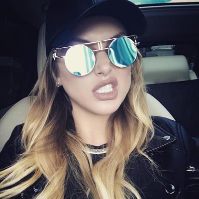 Lala Kent taking a selfie