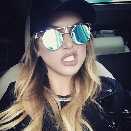 Lala Kent taking a selfie