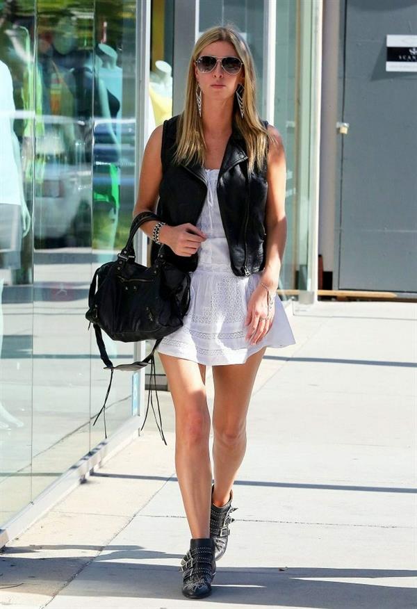 Nicky Hilton in a short white dress while shopping in Beverly Hills March 1, 2013 