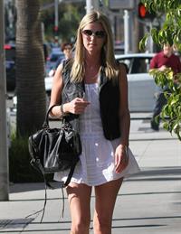 Nicky Hilton in a short white dress while shopping in Beverly Hills March 1, 2013 