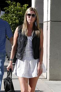Nicky Hilton in a short white dress while shopping in Beverly Hills March 1, 2013 