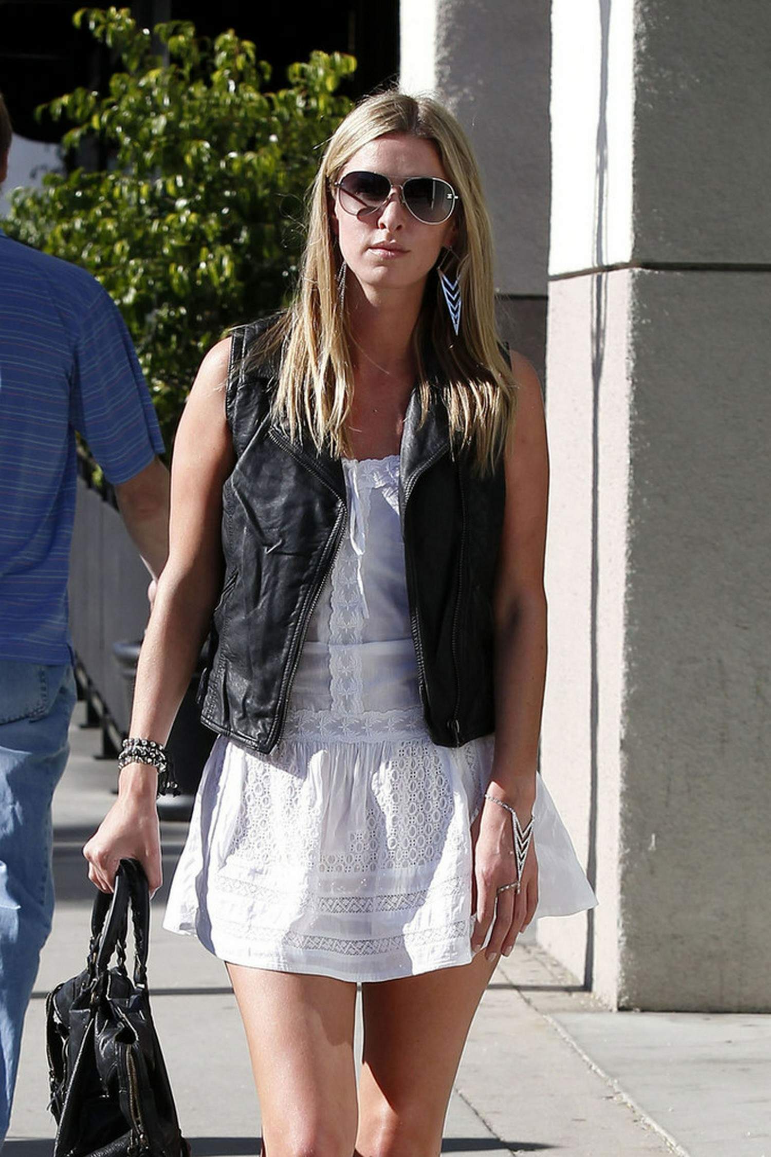 Nicky Hilton in a short white dress while shopping in Beverly Hills March 1, 2013 