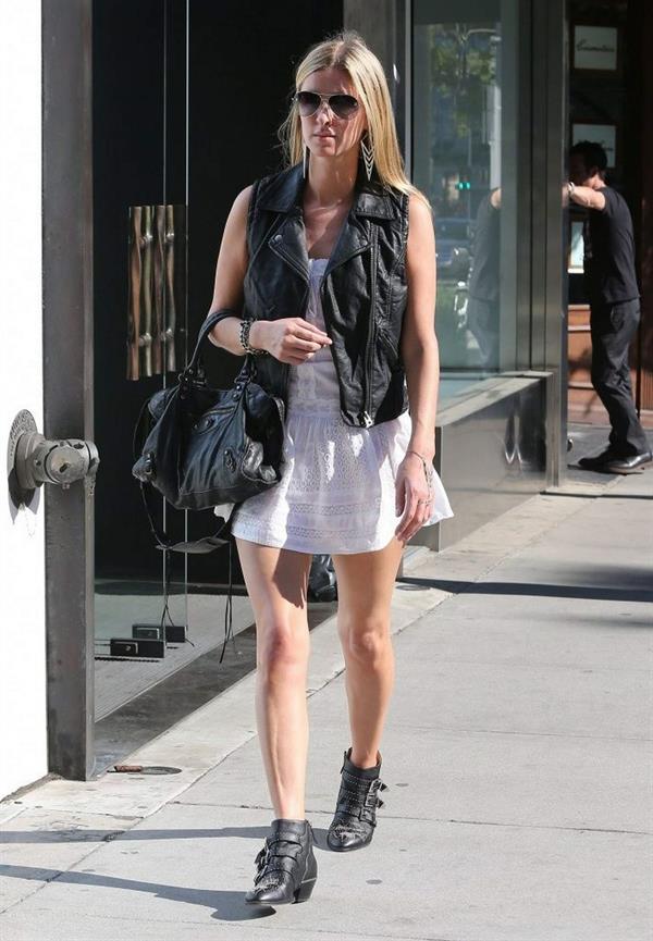 Nicky Hilton in a short white dress while shopping in Beverly Hills March 1, 2013 