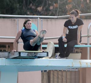 Nicole Eggert prepares for 'Splash' (sports bra/wetsuit) 6.2.2013 