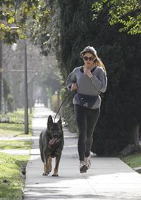 Nikki Reed jogging with her dog Enzo in Los Angeles on February 6, 2013