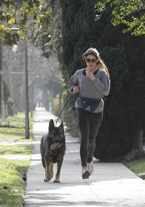 Nikki Reed jogging with her dog Enzo in Los Angeles on February 6, 2013