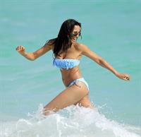 Padma Lakshmi in a bikini on the beach in Miami, Florida - December 8, 2012 