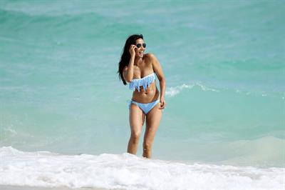 Padma Lakshmi in a bikini on the beach in Miami, Florida - December 8, 2012 