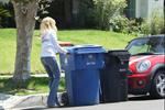 Rachel McAdams throws out the trash in Beverly Hills August 3, 2012