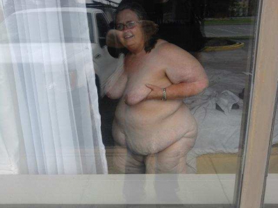 Showing myself in a hotel room in front of an open window