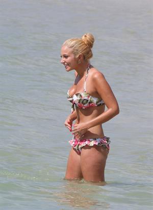 Tulisa Contostavlos in a bikini on the beach in Honolulu July 31, 2012
