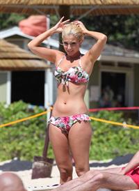 Tulisa Contostavlos in a bikini on the beach in Honolulu July 31, 2012