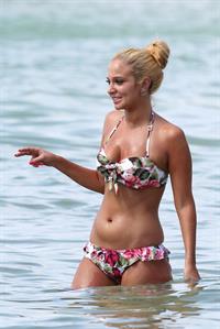 Tulisa Contostavlos in a bikini on the beach in Honolulu July 31, 2012