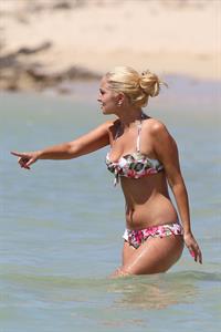 Tulisa Contostavlos in a bikini on the beach in Honolulu July 31, 2012