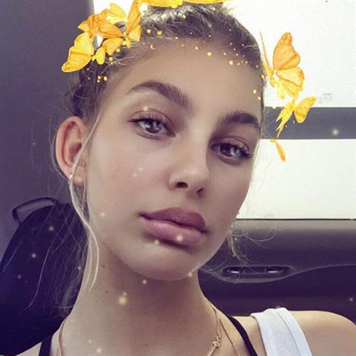 Camila Morrone taking a selfie