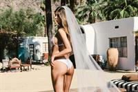 Camila Morrone in a bikini - ass
