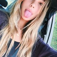 Camila Morrone taking a selfie