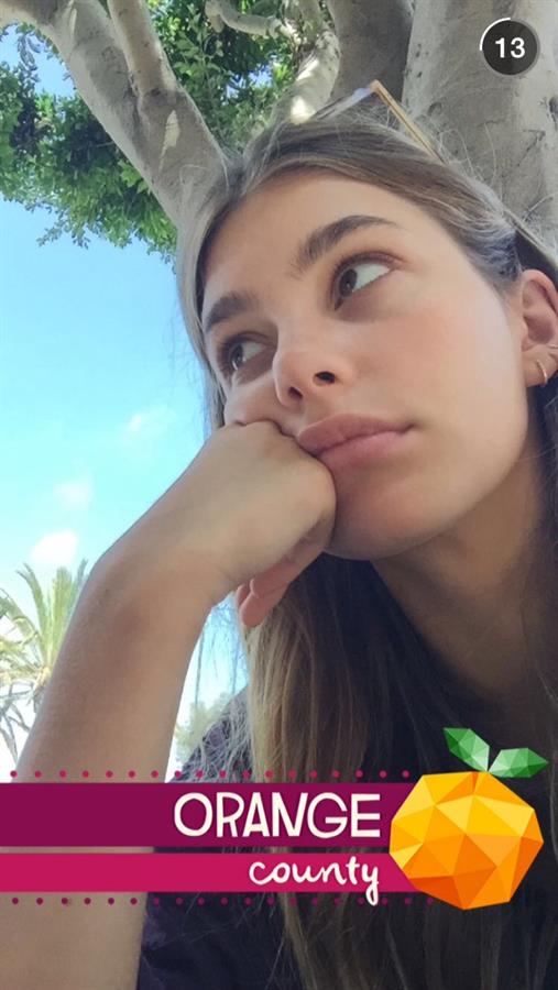 Camila Morrone taking a selfie