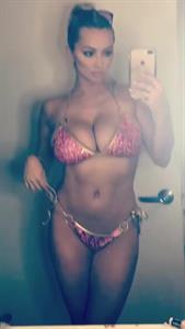 Lindsey Pelas in a bikini taking a selfie