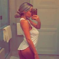 Lindsey Pelas taking a selfie and - ass