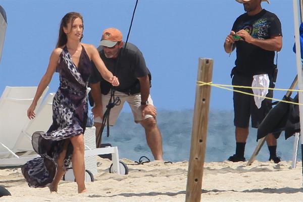 Minka Kelly on the set of Charlie's Angels on a beach in Miami 02-09-2011