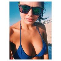 Alana Campos in a bikini taking a selfie