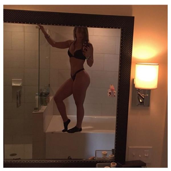 Nicole Mejia in lingerie taking a selfie