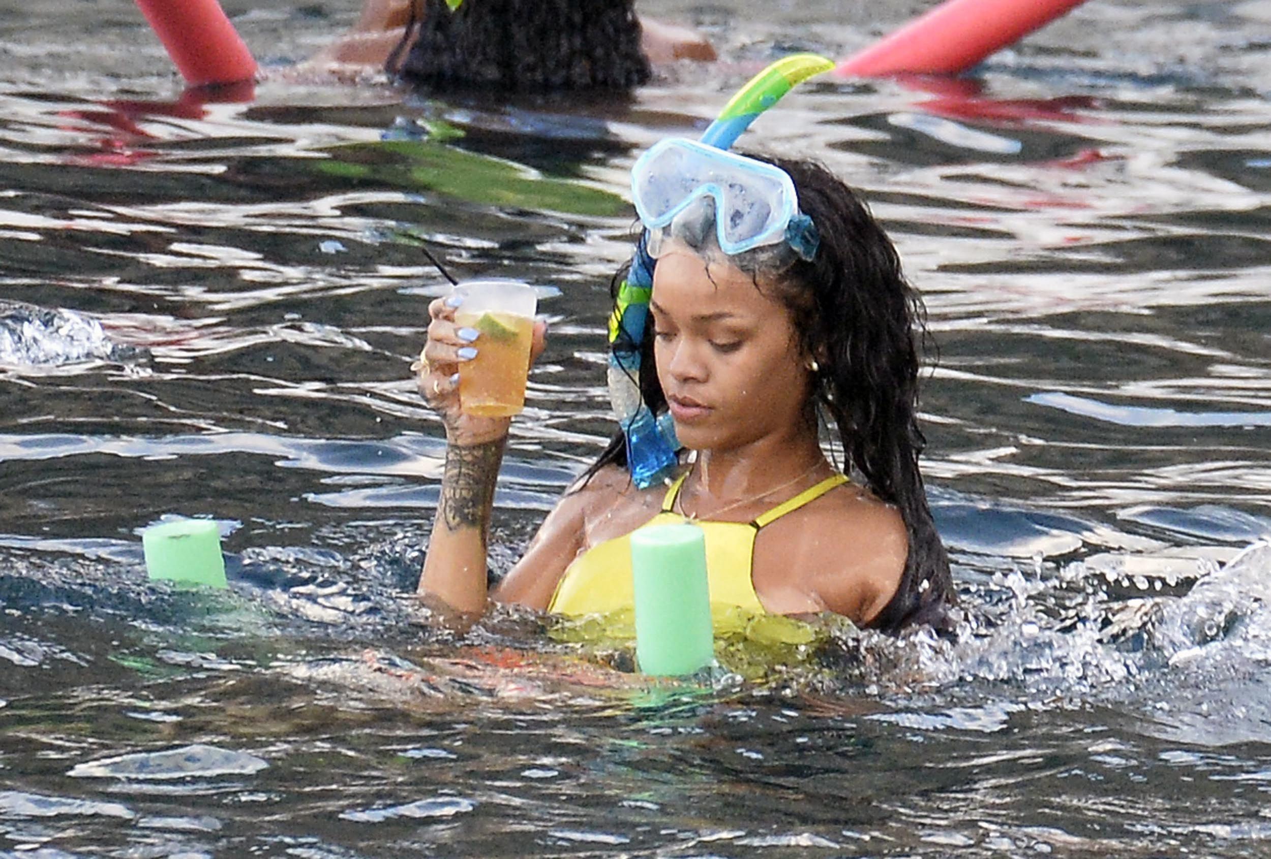 Rihanna enjoying a break on a yacht in Ponza August 29, 2014