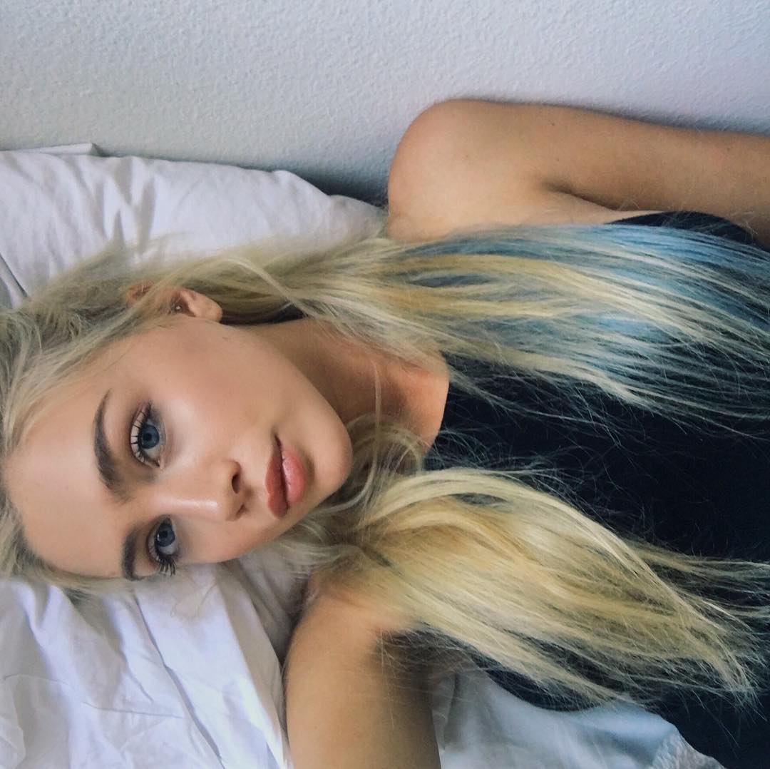 Taylor Godfrey taking a selfie