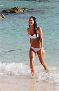 Tulisa Contostavlos in a bikini on the beach in Bermuda August 21, 2014