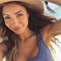 Pia Muehlenbeck in a bikini taking a selfie