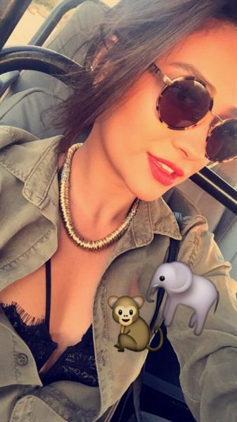 Shay Mitchell taking a selfie