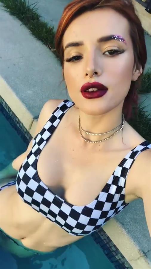 Bella Thorne in a bikini taking a selfie