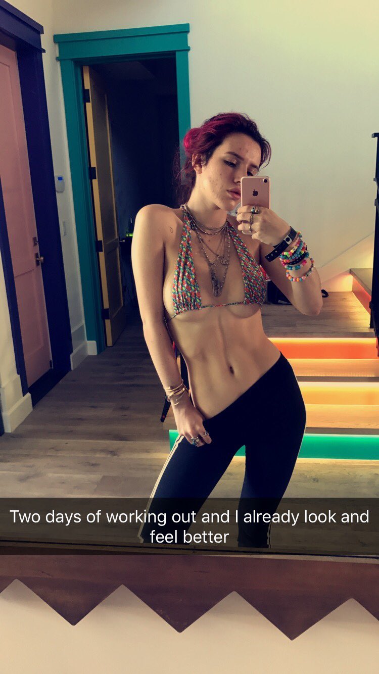 Bella Thorne in a bikini taking a selfie