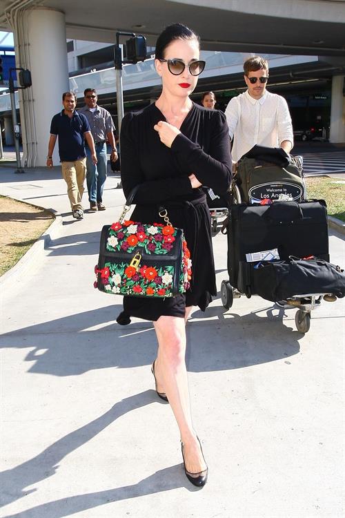Dita Von Teese arrives from a flight at LAX August 20, 2014