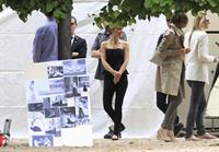 Natalie Portman modeling for a Miss Dior campaign photo shoot in the gardens of the Palais Royal in Paris 6/26/12 
