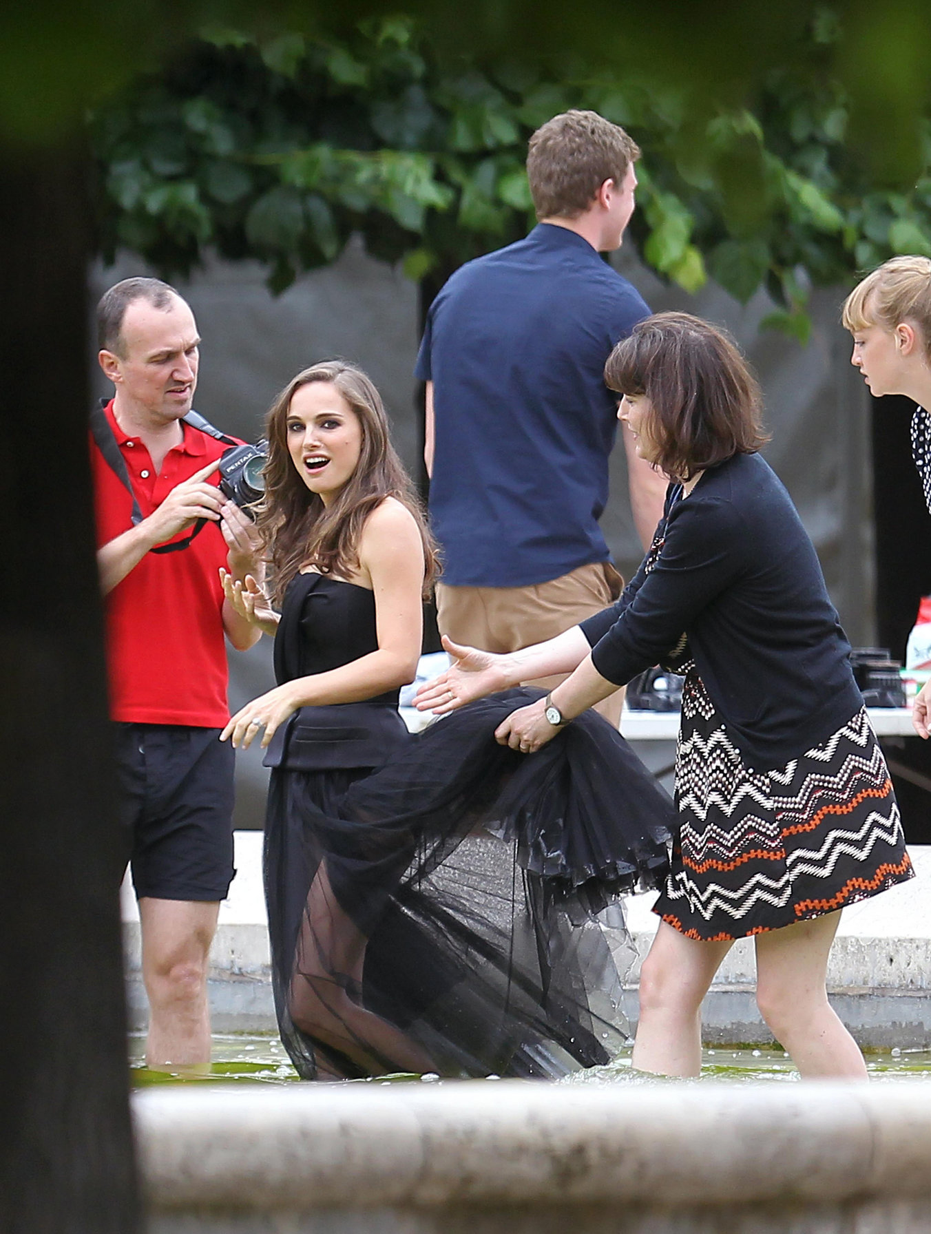 Natalie Portman modeling for a Miss Dior campaign photo shoot in the gardens of the Palais Royal in Paris 6/26/12 