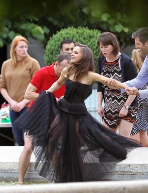 Natalie Portman modeling for a Miss Dior campaign photo shoot in the gardens of the Palais Royal in Paris 6/26/12 
