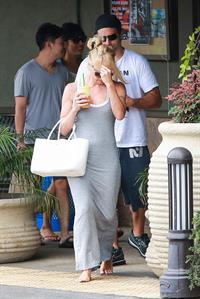 Pamela Anderson leaves barefoot a local Restaurant with a friend in Malibu July 6, 2013 