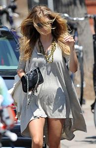 AnnaLynne McCords dress blew up to reveal her underwear in Venice, August 20, 2014