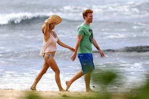 Pamela Anderson Takes a walk in bikini bottoms on the Island of Maui December 30, 2012 