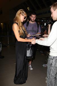 Paris Hilton arrive at LAX Airport 9/30/13